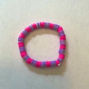 Handmade purple and pink bracelet.